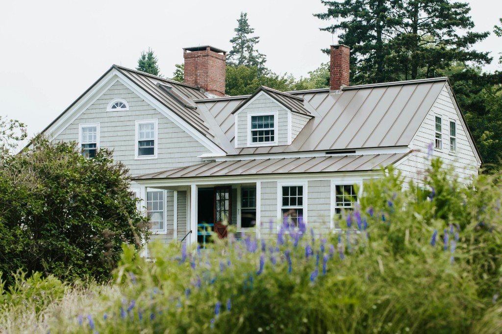 Roofing contractor working on a residential roof