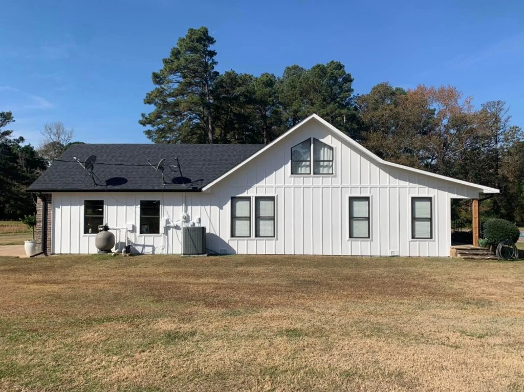 Charcoal brick and light blue siding exterior