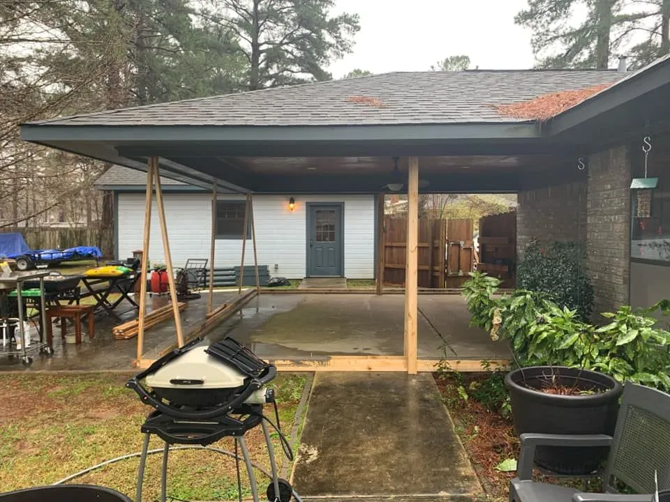 Light blue siding exterior during window installation